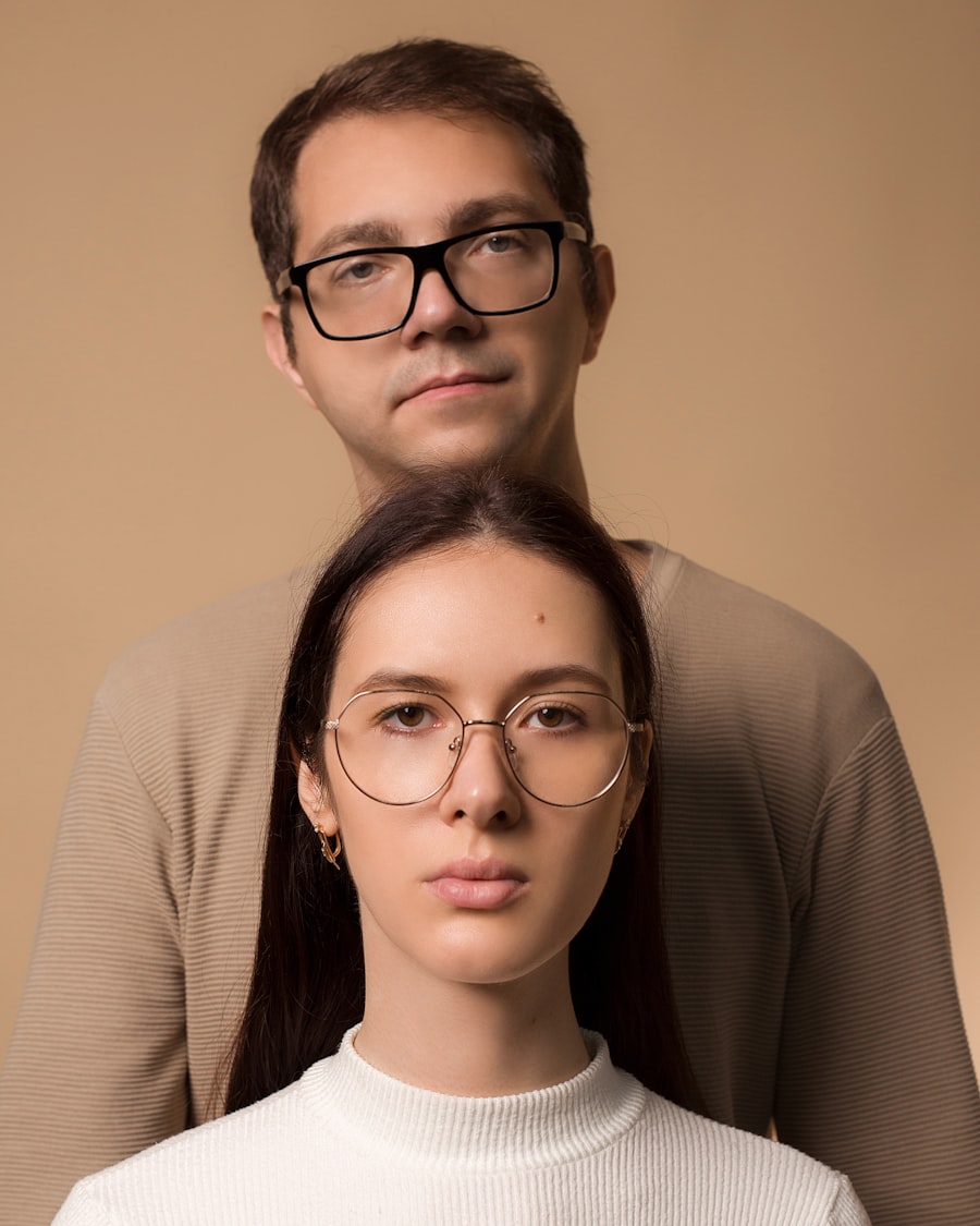 Two customers wearing Lunet frames against a neutral studio backdrop