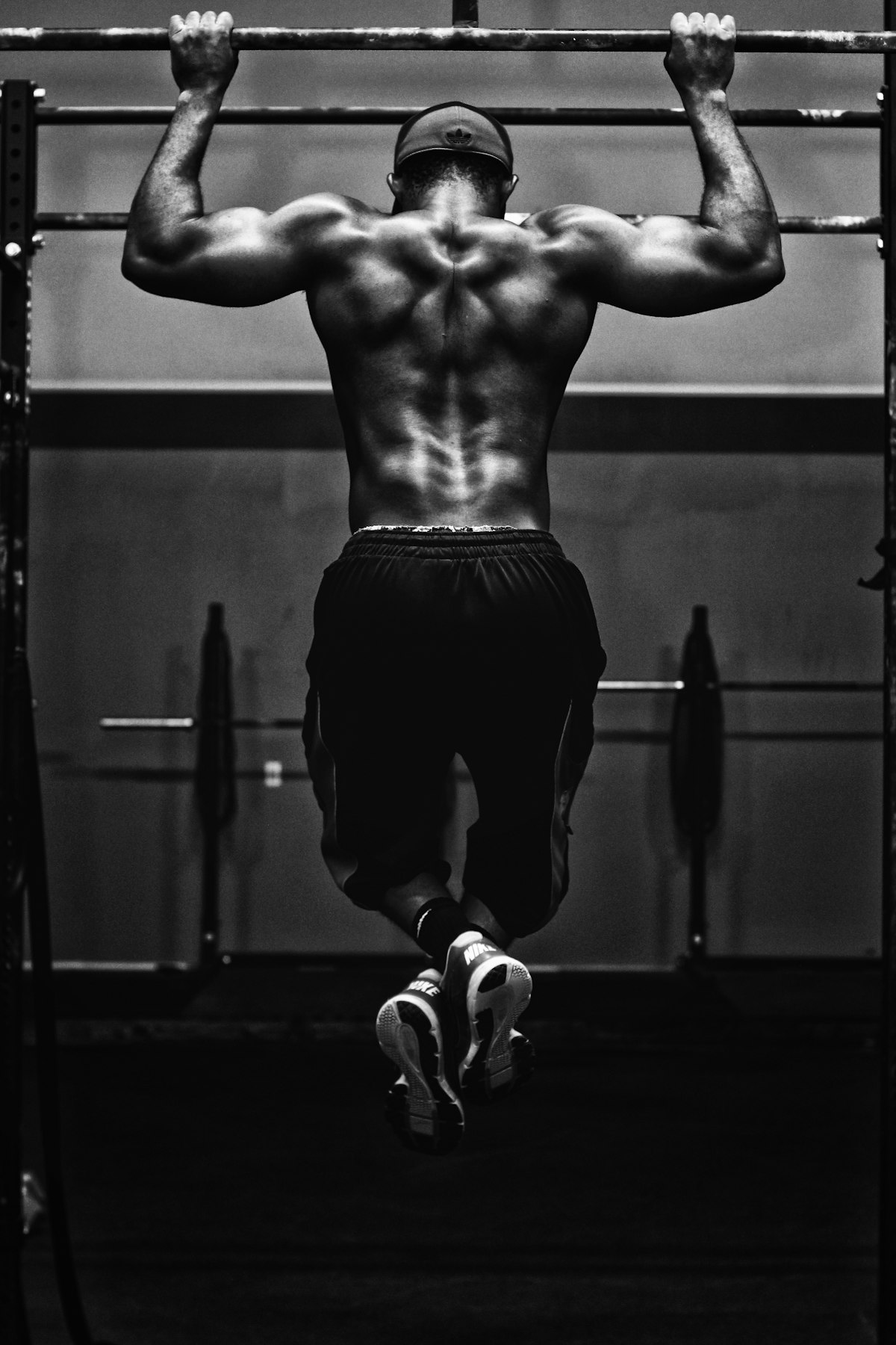Athlete performing a heavy barbell back squat