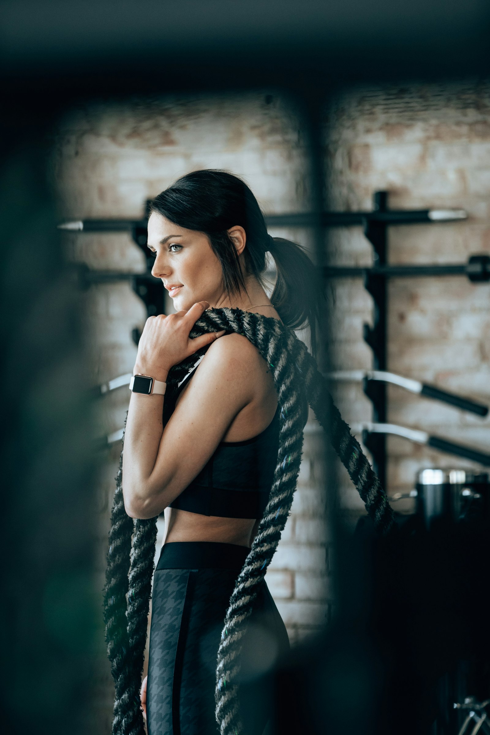 Coach Sasha Adeyemi with battle ropes at the studio