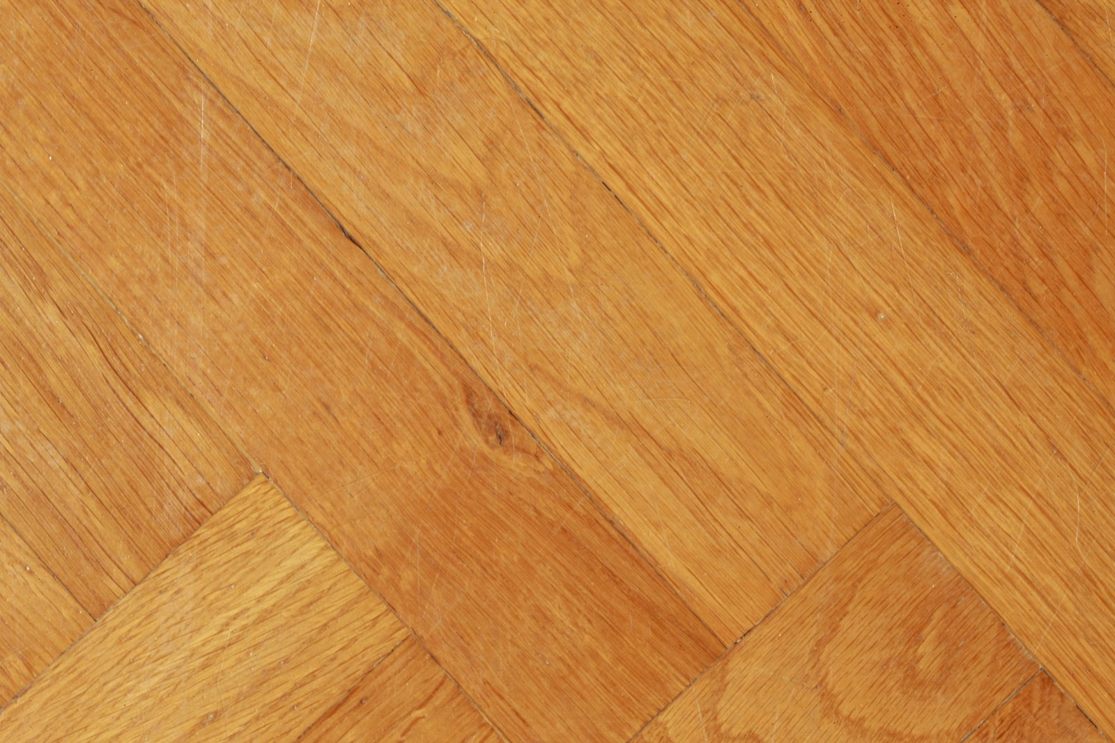 Close-up of herringbone oak parquet floorboards